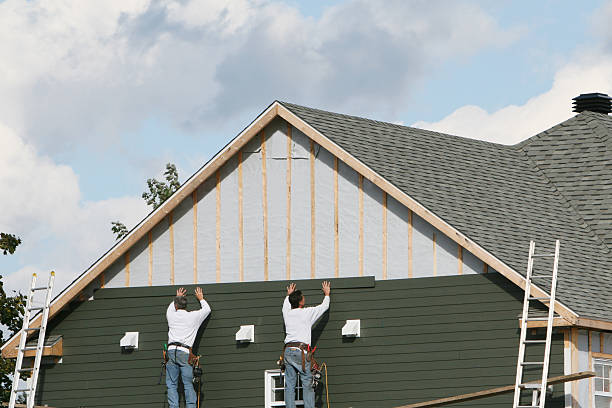 Professional Siding Installation technician working in Lilly, PA